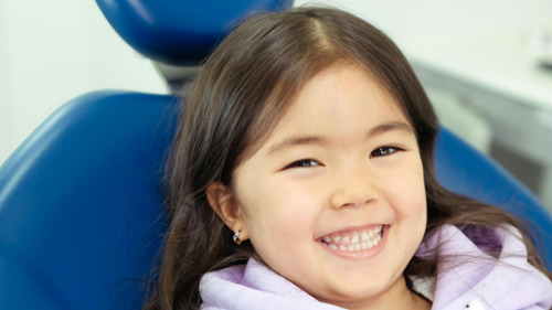 Child receiving gentle dental care at Finer Smiles Dental in Encino CA 